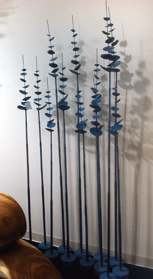 lotus shaped leaves on a metal stand