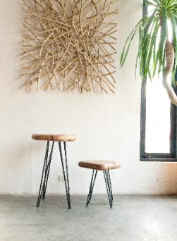 stick wall art and pebble stools