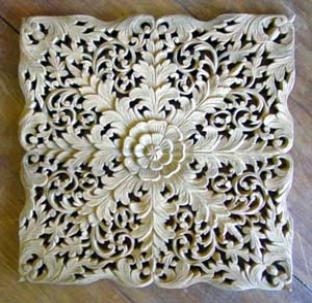 carved teak panel
