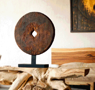 organic console with reclaimed ox cart wheel